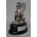 A FILLED SILVER MODEL OF THE SPHINX, maker Camelot Silverware, Sheffield 2008, the seated creature