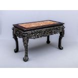 A CHINESE HUANGHUALI WOOD SIDE TABLE, 19th century, the beaded edged oblong top inset with red