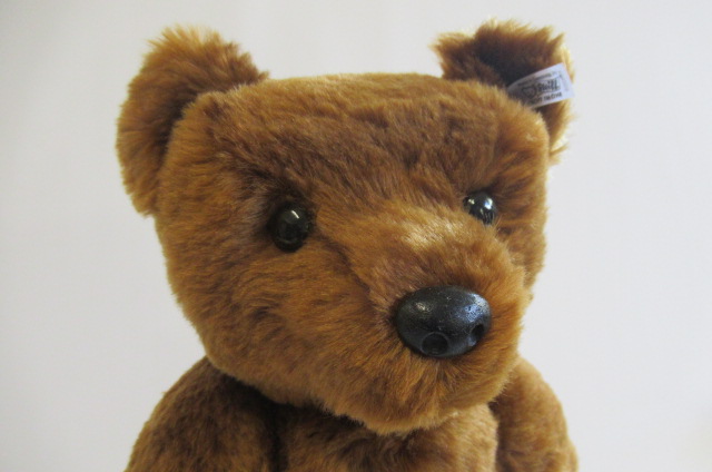 A boxed Steiff 1902 replica bear, with ear button, tag and label, certificate in box, 21" long - Image 3 of 3