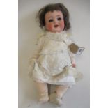 A Heubach Koppelsdorf bisque socket head character doll, with blue glass sleeping eyes, open