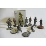 Ten 85mm military figures, some items detached from base, and a boxed historical knight on