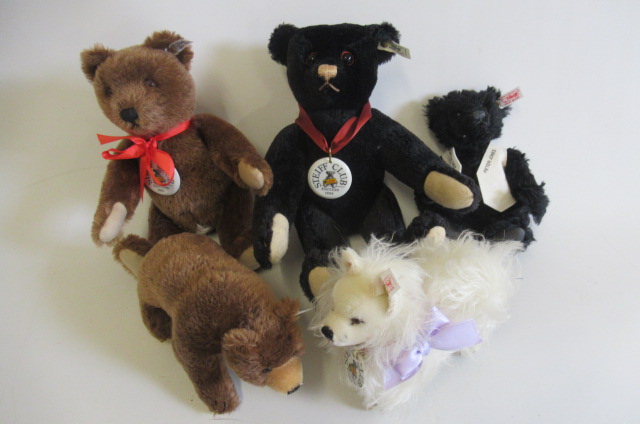 Five Steiff Club Bears, including a 2001 brown bear, 2003 Peter Jones bear, a Shitzu and a bi-