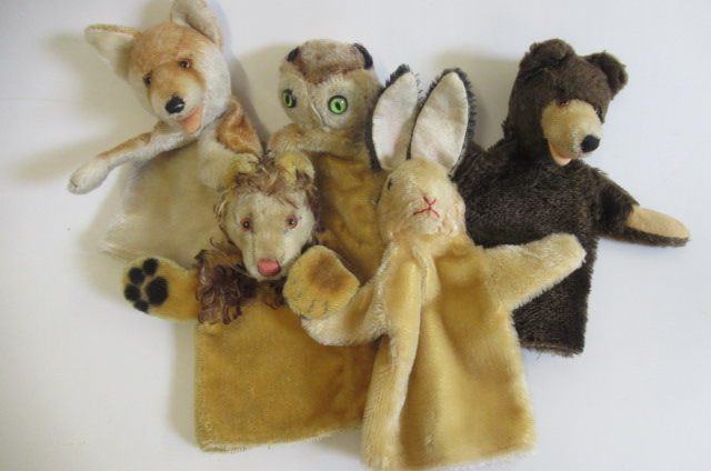 Five vintage plush puppets, possibly Steiff, comprising a lion, an owl, a rabbit, a fox and a bear