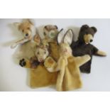 Five vintage plush puppets, possibly Steiff, comprising a lion, an owl, a rabbit, a fox and a bear