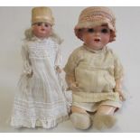 Two bisque socket head dolls, comprising a Franz Schmidt & Co. girl with brown glass sleeping