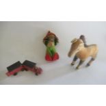 Two Steiff items, comprising an Okapi with button eyes and brush main, and a Lucki in felt outfit,