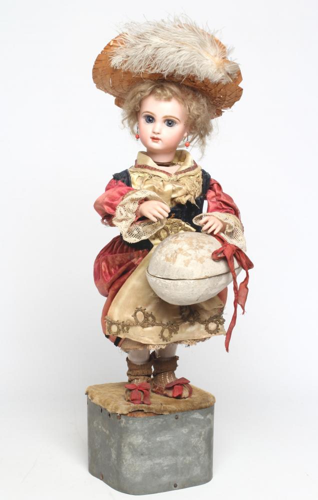 A Tete Jumeau automaton, with bisque head and hands, blue glass paperweight fixed eyes, mouth