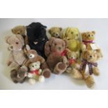 Twelve teddies, comprising four Past Times bears, three with certificates, three Real Soft Toys