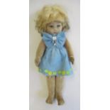 A Chad Valley Bambina doll, felt construction, blue glass fixed eyes, blond wig, jointed body,