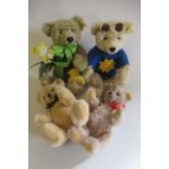 Four Steiff collector's teddies, comprising Sunny with certificate, Dylan with certificate, a grey