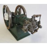 A single cylinder gas engine rotary valve, twin fly wheels, ignition plug absent, 30cm x 20cm x