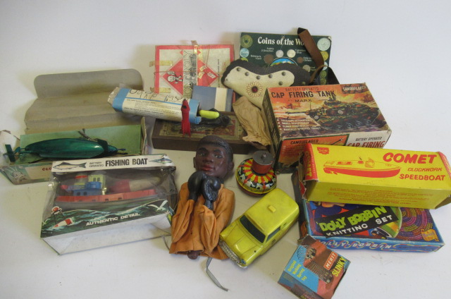 Toys and games from the 1960's including Sutcliffe clockwork boat, battery operated Marx tank,