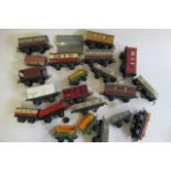 Unboxed Hornby goods wagons and coaches, most items post war types, F-P