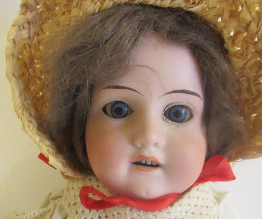 An Armand Marseille bisque shoulder head doll, with blue glass sleeping eyes, open mouth, teeth, - Bild 2 aus 3