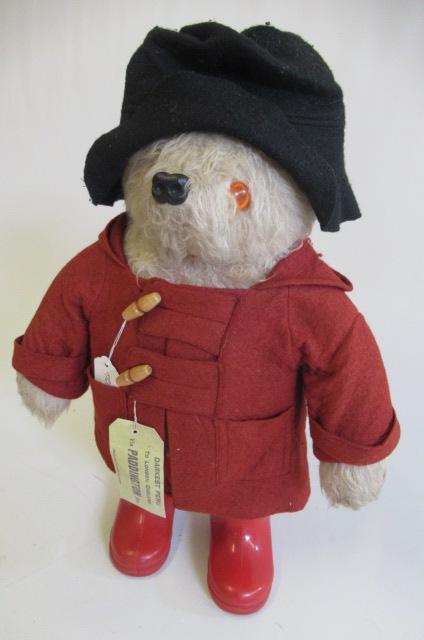 A Paddington bear, with red coat, red wellies and label - Image 2 of 3
