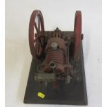 A single cylinder gas engine, much rusting to metal part, requires some restoration, 30cm x 20cm x