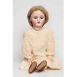 A C. M. Bergmann bisque socket head doll, with blue glass sleeping eyes, open mouth, top teeth,