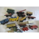 Unboxed Hornby wagons and coach, most items post-war type, F-P