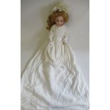 An A Lanternier & Cie bisque socket head Cherie doll, with blue glass sleeping eyes, open mouth,