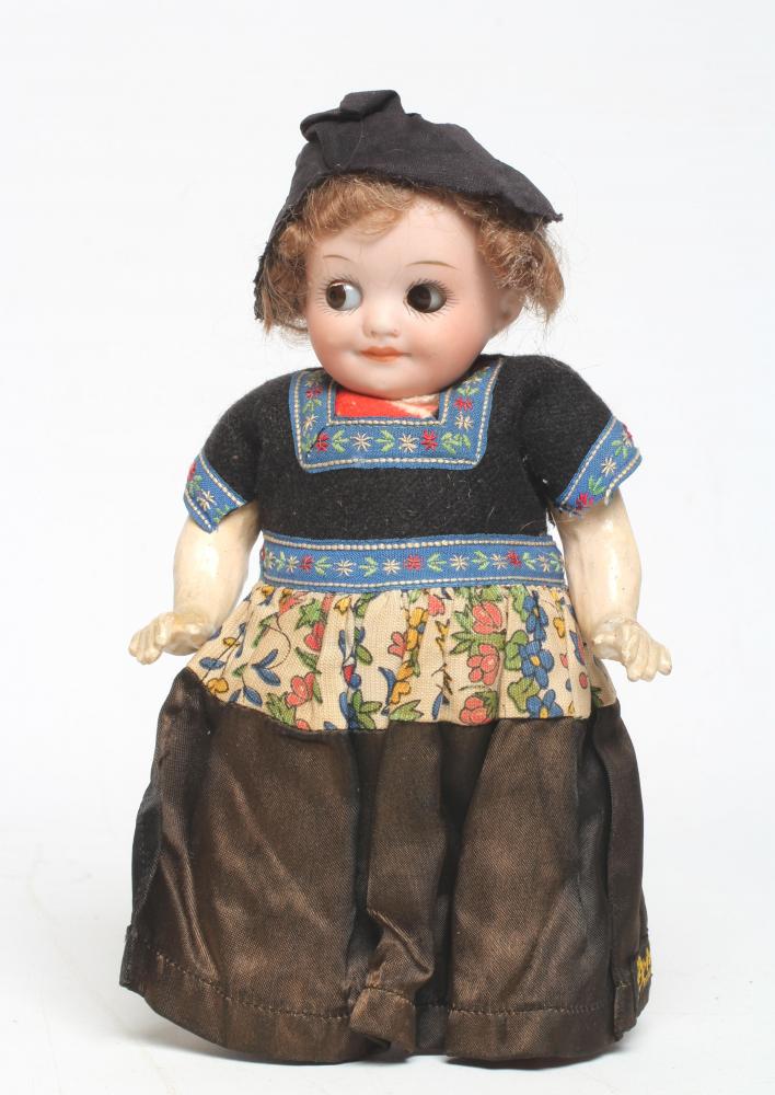 An Armand Marseille googlie eye Dutch girl, with bisque socket head, brown glass sleeping eyes,