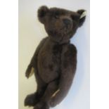 A boxed Steiff British Collector's 1907 replica teddy bear, No.01236, with brown plush, growl, ear