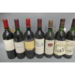 7 bottles St. Emilion red bordeaux, comprising 1 1982 and 1 1983 Ch. Laroque, 1 1975 Ch. Hautes