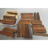 Approximately 40 Copper cigar printing blocks, mounted on hardwood