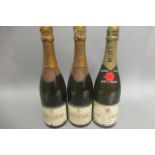 Three bottles of champagne, comprising 2 Piper-Heidsieck piper tres sec and 1 Moet & Chandon