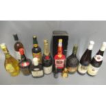 An assortment of wine & liqueur, including 1 boxed Cherry Marnier, 1 Remy Martin fine champagne