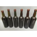 Six bottles believed port, wax seals, bottles circa 1950s