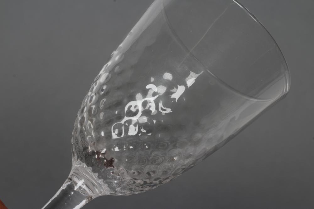 A WINE GLASS, mid 18th century, the honeycomb mould blown round funnel bowl on plain stem, with - Image 2 of 4
