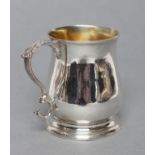 A GEORGE III SMALL MUG, maker possibly William Lukin, London 1763, of baluster form with acanthus