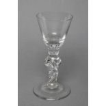 A GOBLET, mid 18th century, the bucket bowl with tear drop on a heavy wrythen tapered stem and domed