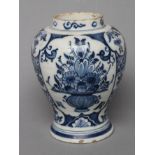 A DUTCH DELFT VASE, late 18th century, of inverted baluster form painted in blue with three panels