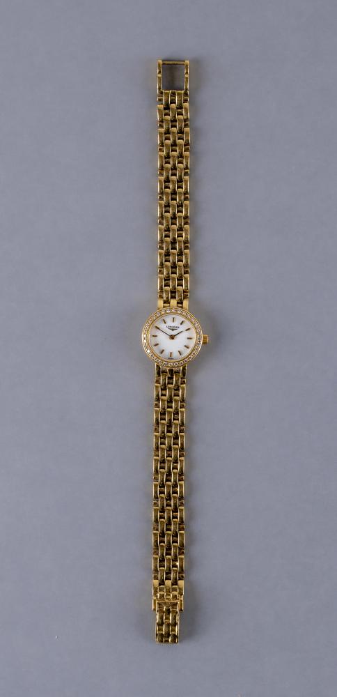 A LADY'S LONGINES 18CT GOLD AND DIAMOND WRISTWATCH, the white dial with gilt batons, the quartz five