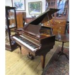 A MAHOGANY CASED BABY GRAND PIANO By John Broadwood & Sons, with solid waisted music stand and