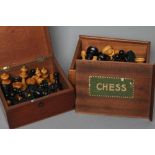 TWO STAUNTON TYPE CHESS SETS, both in natural and ebonised box, kings 3 3/4" and 3" high, both in