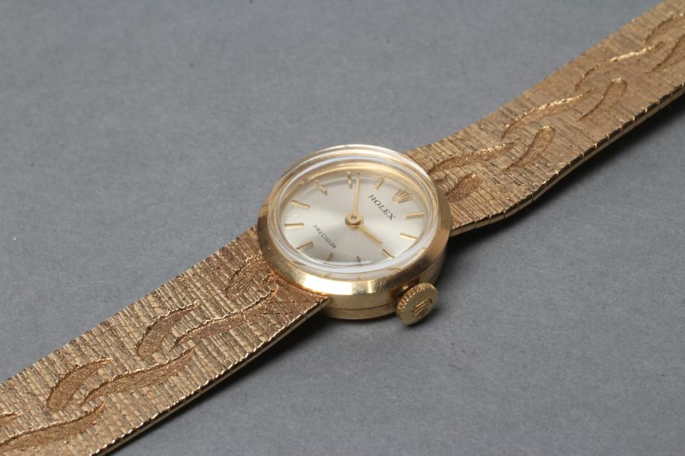 A LADY'S 9CT GOLD ROLEX WRISTWATCH, the champagne dial with gilt metal batons, the eight jewel - Image 2 of 4