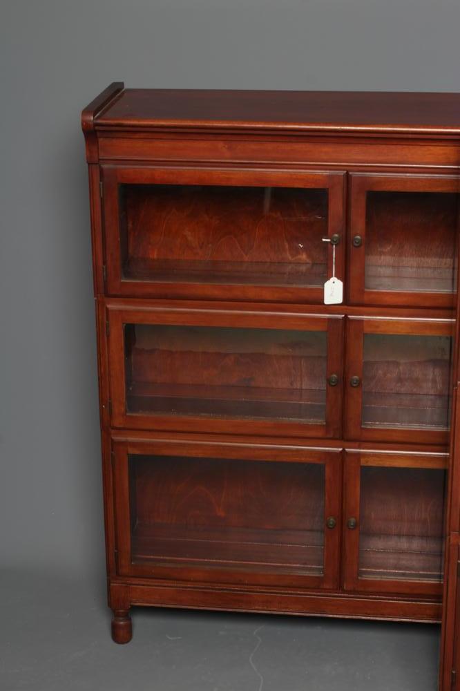 A PAIR OF MAHOGANY BOOKCASES, early 20th century, each with six glazed folding doors enclosing three - Image 2 of 2