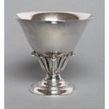 A GEORG JENSEN "LOUVRE" BOWL, stamped Sterling 925 17B, the lightly planished flared bowl on berried