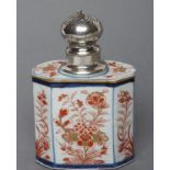A CHINESE IMARI PORCELAIN TEA CANISTER of canted oblong section, painted in underglaze blue and