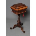 A ROSEWOOD SARCOPHAGUS TEAPOY, early/mid 19th century, the domed lid now opening to a void silk