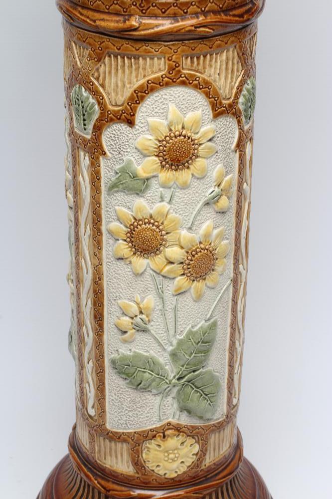 A BURMANTOFTS FAIENCE JARDINIERE AND STAND, early 20th century, moulded in relief and painted in - Image 2 of 6