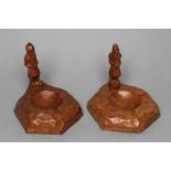 A MATCHED PAIR OF THOMAS WHITTAKER OF LITTLEBECK ADZED OAK ASH TRAYS, the rock like base