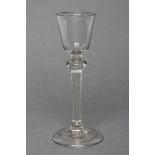 A CORDIAL GLASS, mid 18th century, the round funnel bowl on a plain knopped stem and folded domed