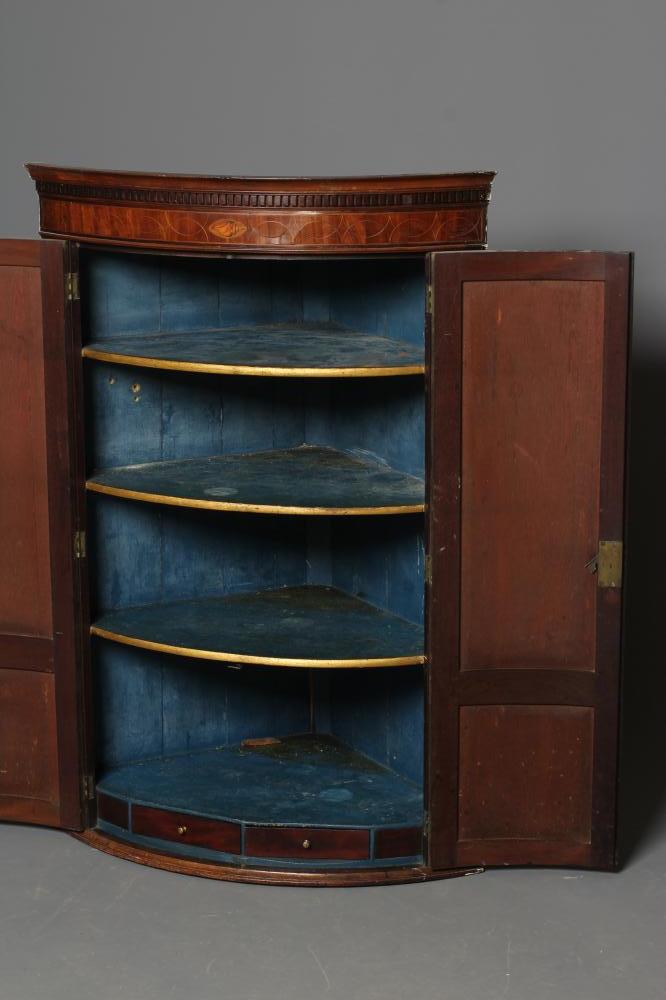 A GEORGIAN MAHOGANY CORNER CUPBOARD, c. 1800, of bowed form with rosewood banding and stringing, - Image 3 of 3