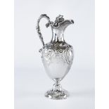 A MID VICTORIAN CLARET JUG, possibly William Smiley, London 1860, of vase form, the hinged cover