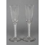 A PAIR OF ALE GLASSES, late 18th century, the round funnel bowls wheel engraved with hops and barley