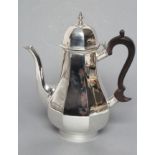 A COFFEE POT, maker's mark indistinct (Hs), London 1924, of plain octagonal form with hinged high