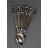 A SET OF SIX GEORG JENSEN TEASPOONS, stamped Sterling, in Acorn pattern, 4 1/2" long, 2ozs 15dwts